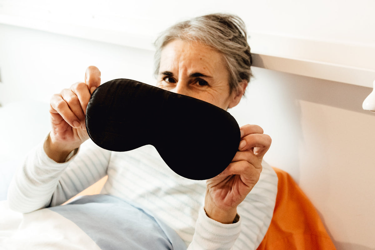 woman with a sleep mask.