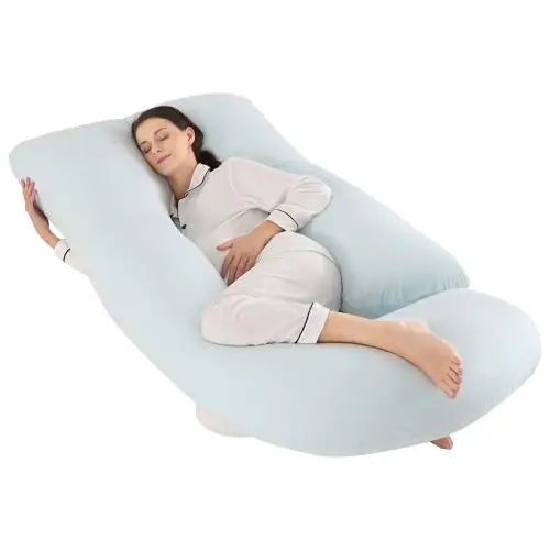 Light blue J-shaped pregnancy pillow.