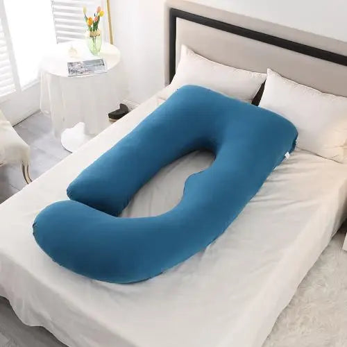Blue J-shaped pregnancy pillow.