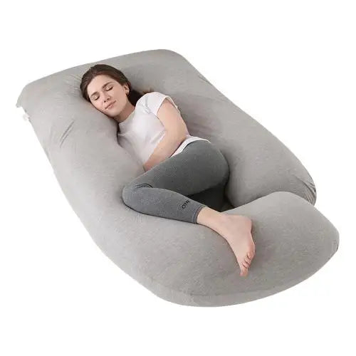 Grey J-shaped pregnancy pillow.