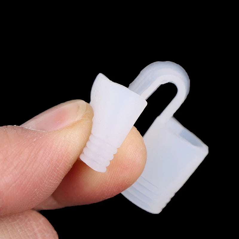 White silicone nasal dilator sleep apnea soft enough to be pressed upon.