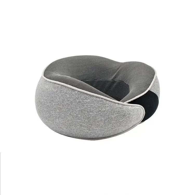 Gray neck pillow with black interior on a white background