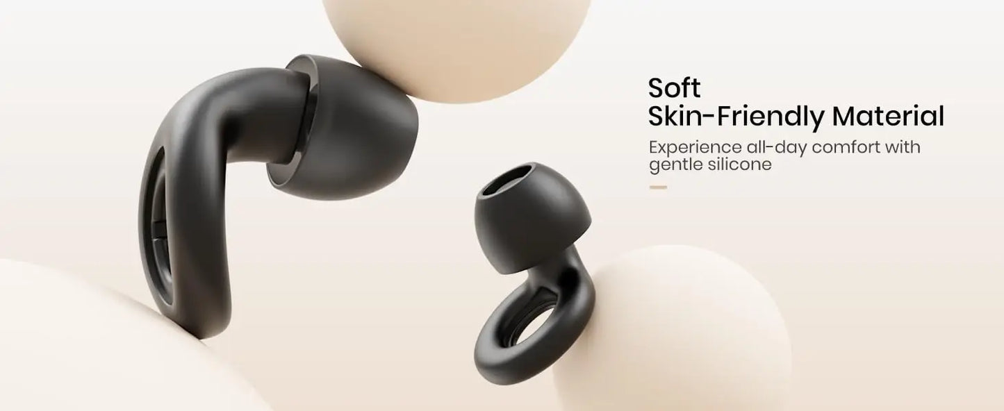 Black wireless noise reduction earbuds in soft skin-friendly material.