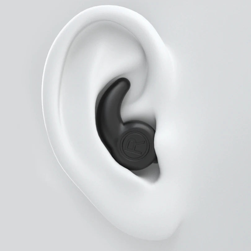 Black earbud fit snugly in the ear.