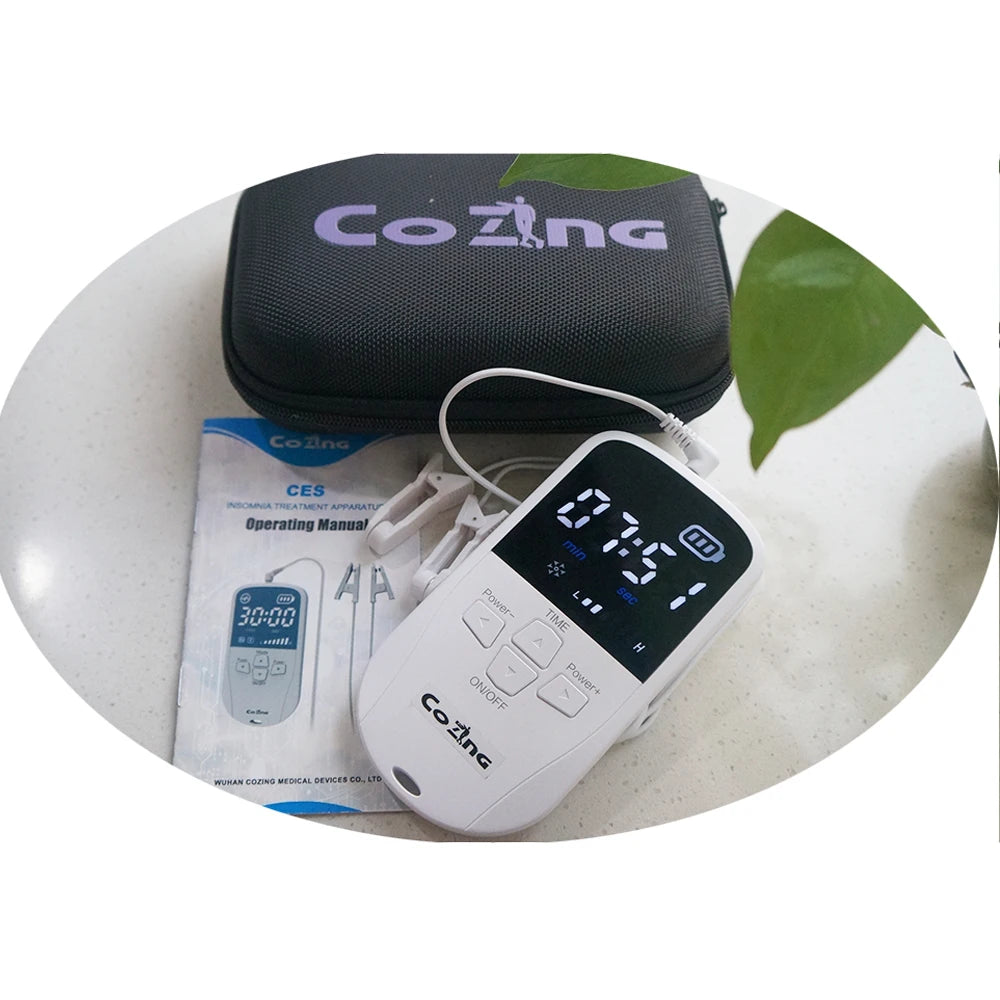 CoZing electronic CES sleep device with carrying case and manual.