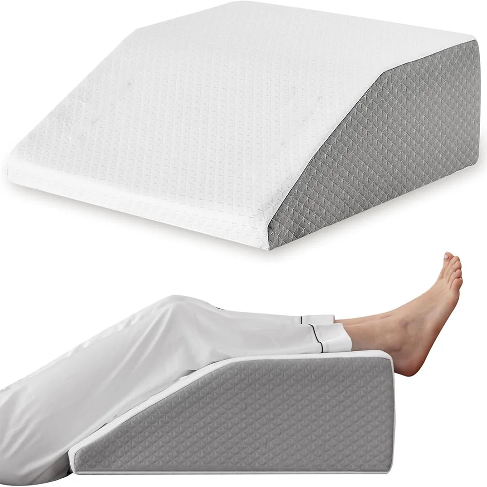 Gray and white wedge inclined acid reflux pillows with a person using them on a white background