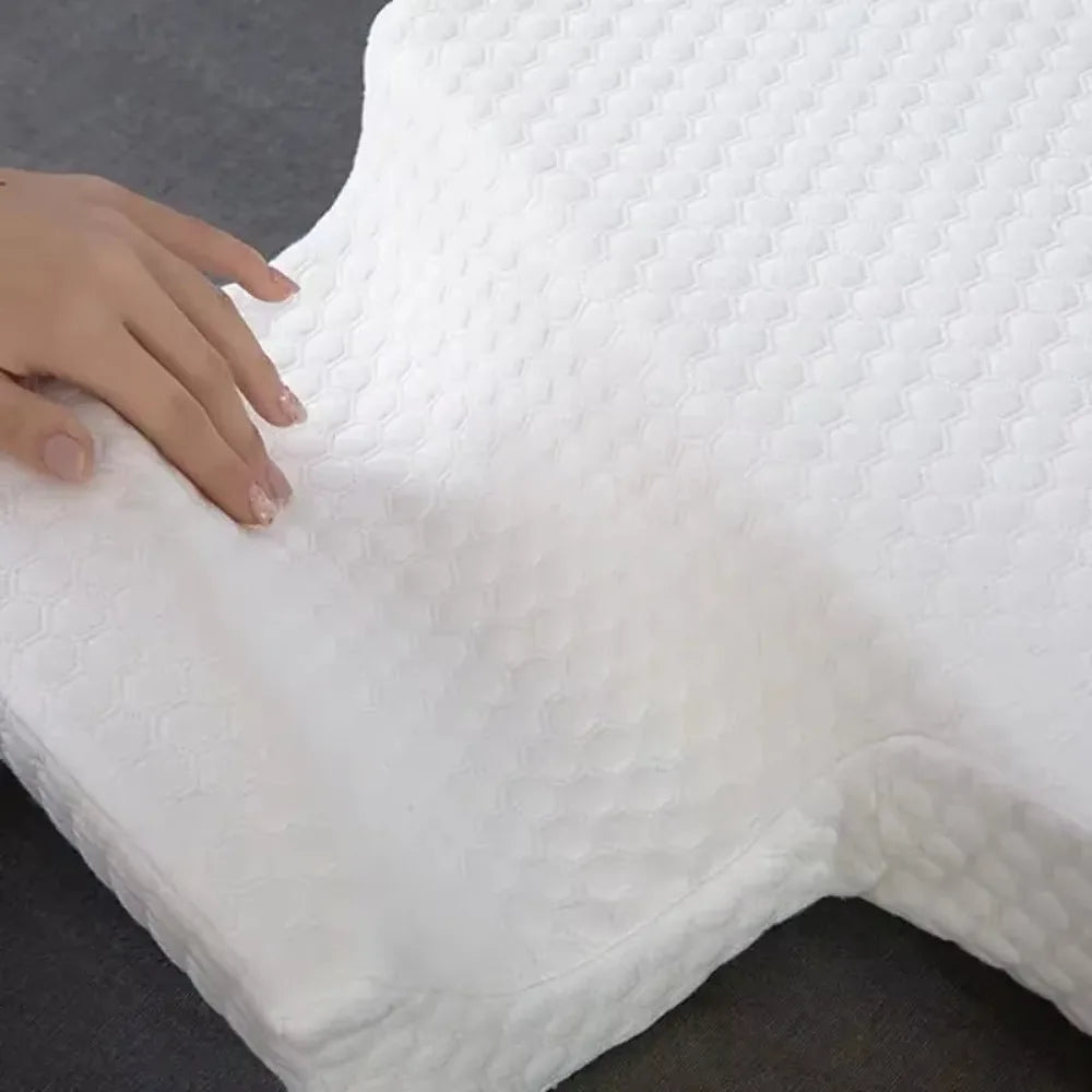 White orthopedic pillow with memory foam for best support.