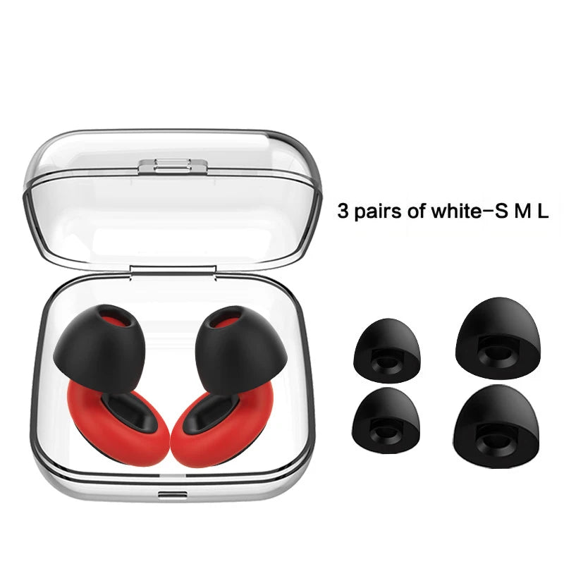 Black earbuds with red accents in a clear case, accompanied by three pairs of black earbud tips on a white background.