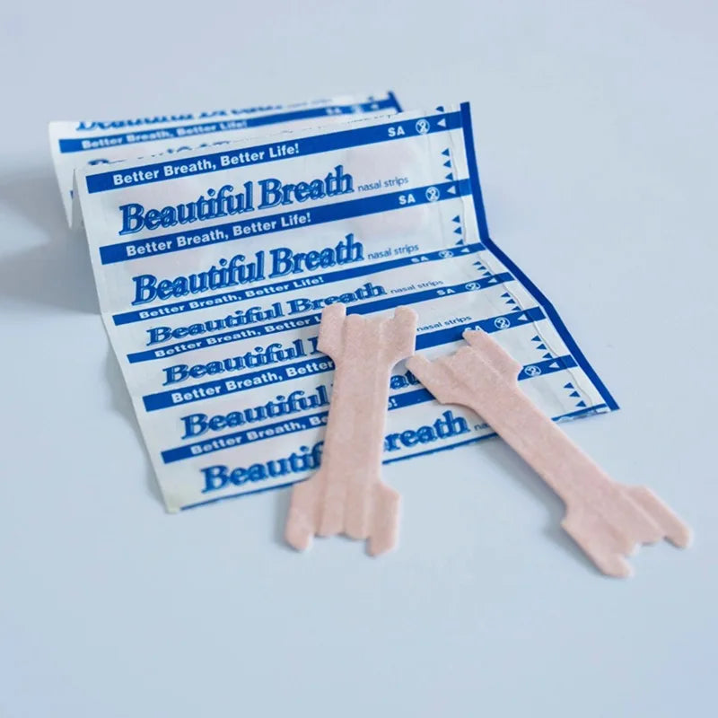 Breathe better nasal Sleep Apnea strips to open up nasal airways anti snore. Packaging and strips close up view.