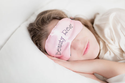 Lady sleeping soundly with eye mask