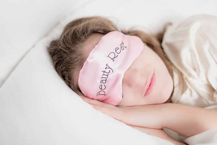 Lady sleeping soundly with eye mask