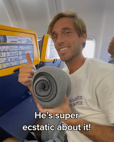 Video showing a man using the Travel pillow U-shaped while in  plane.