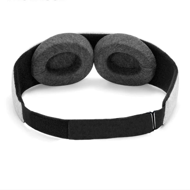 Grey sleeping mask with 2 eye socket cups. Comfort wearing.