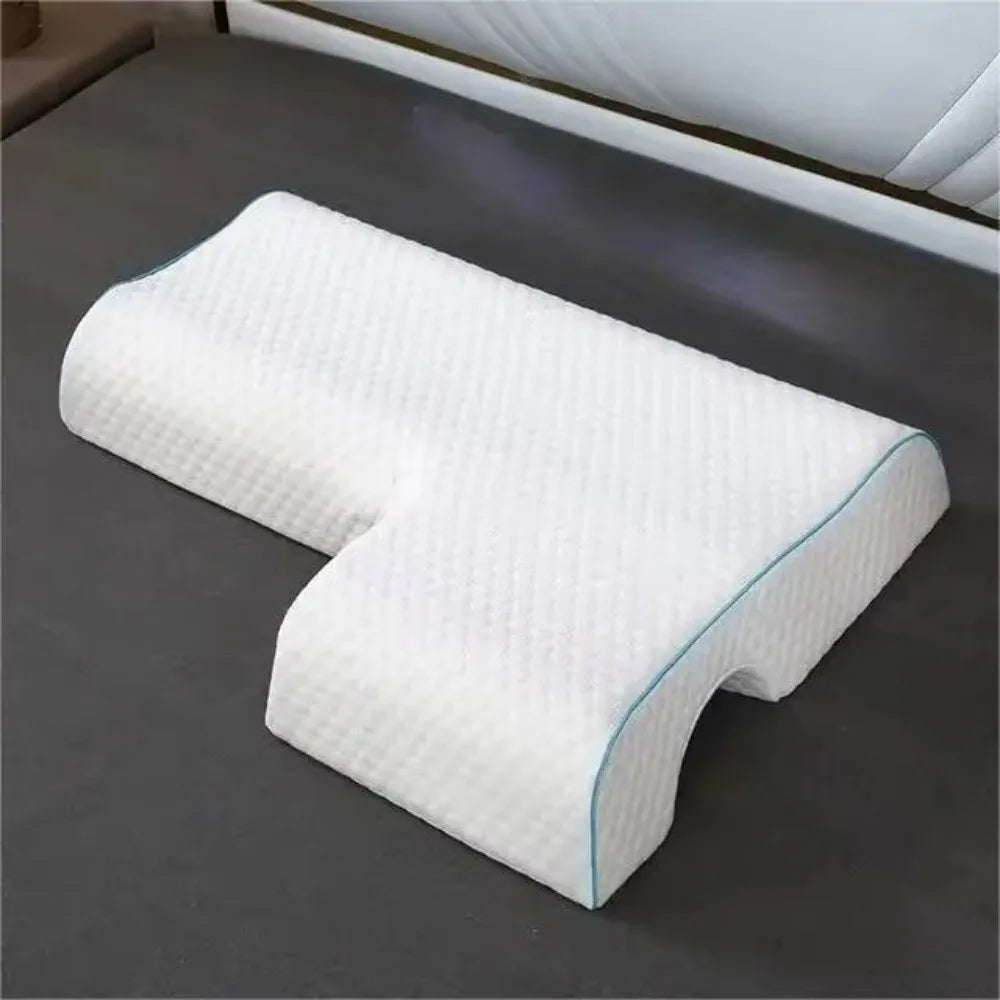 White orthopedic pillow left side sleeper.