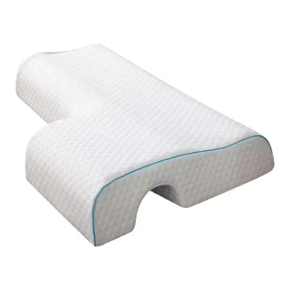 Orthopedic pillow with quilted surface on a white background.