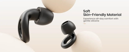 Black wireless noise reduction earbuds in soft skin-friendly material.