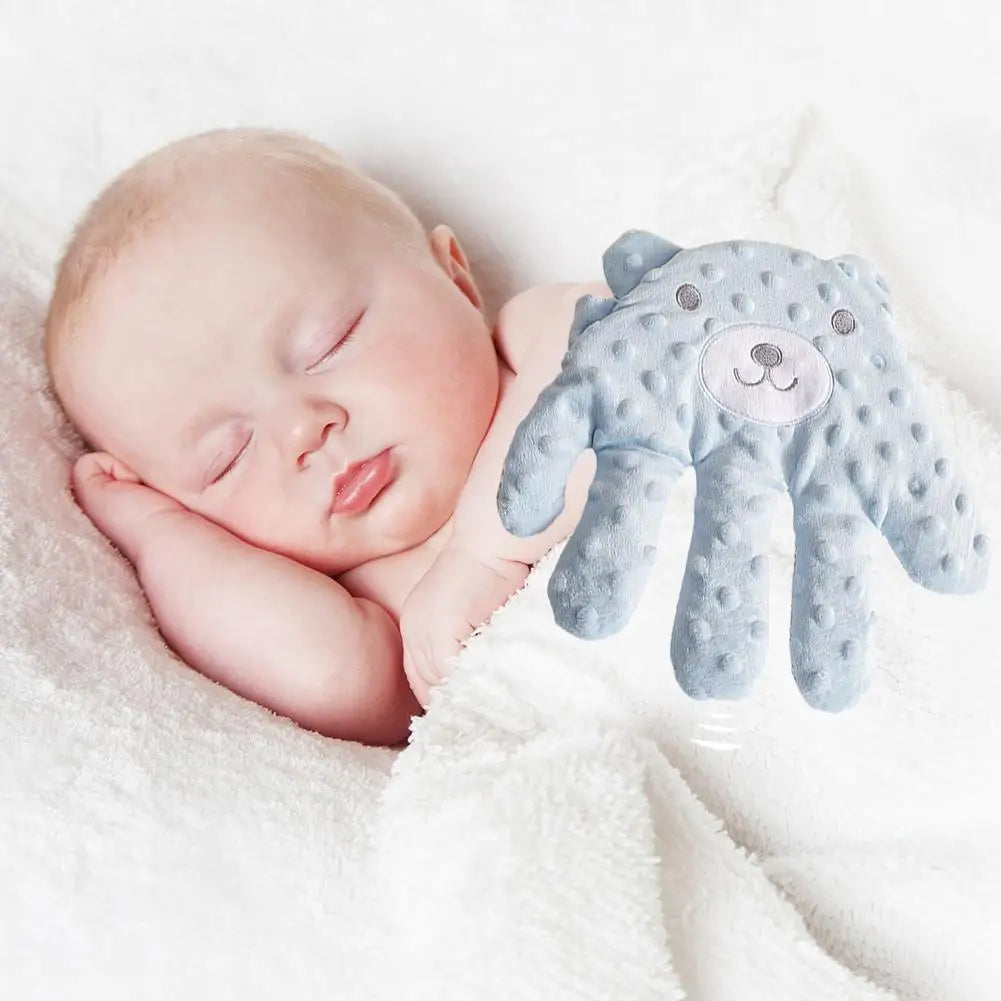 Automatic Blue electric hand clapper on the baby. 
