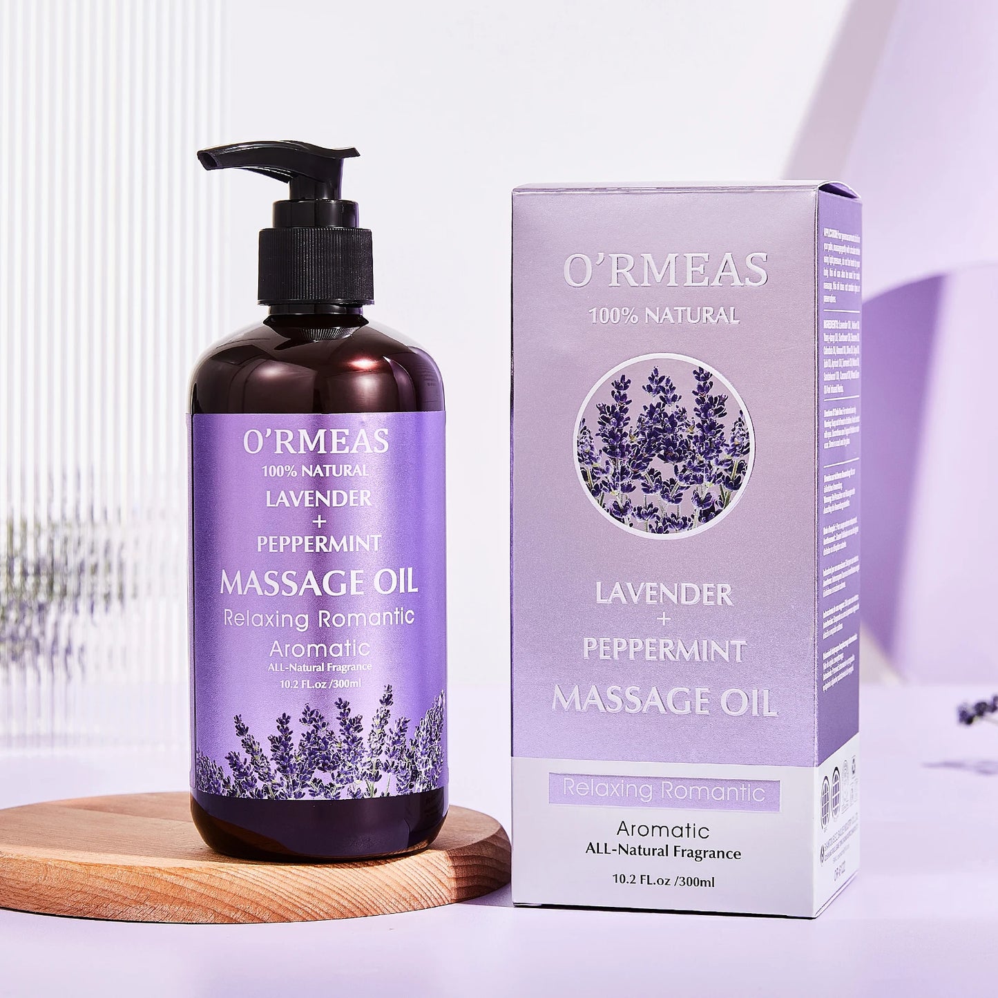 O'rMeas lavender and peppermint massage oil bottle and packaging on a white background
