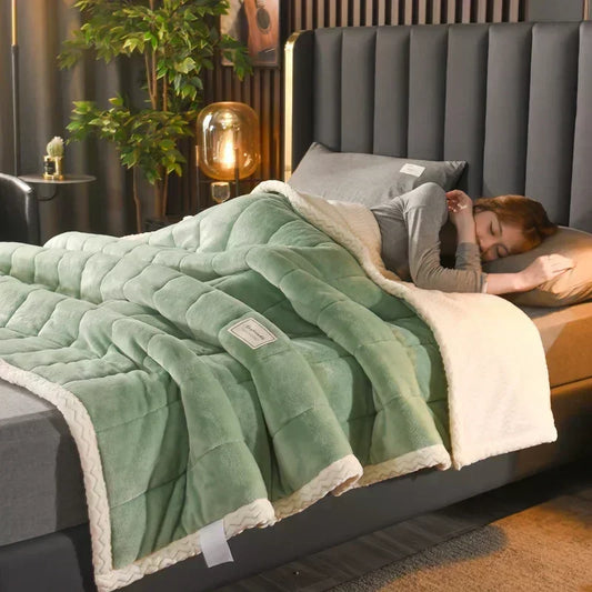 Woman lying on bed using the milk fleece weighted blanket and sleeping soundly.
