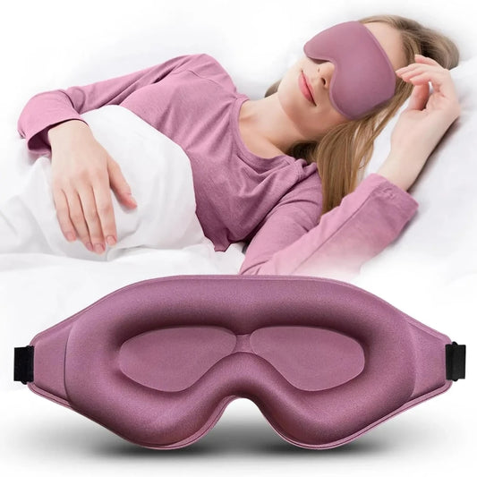 Person wearing a purple sleep mask with another mask displayed in front.