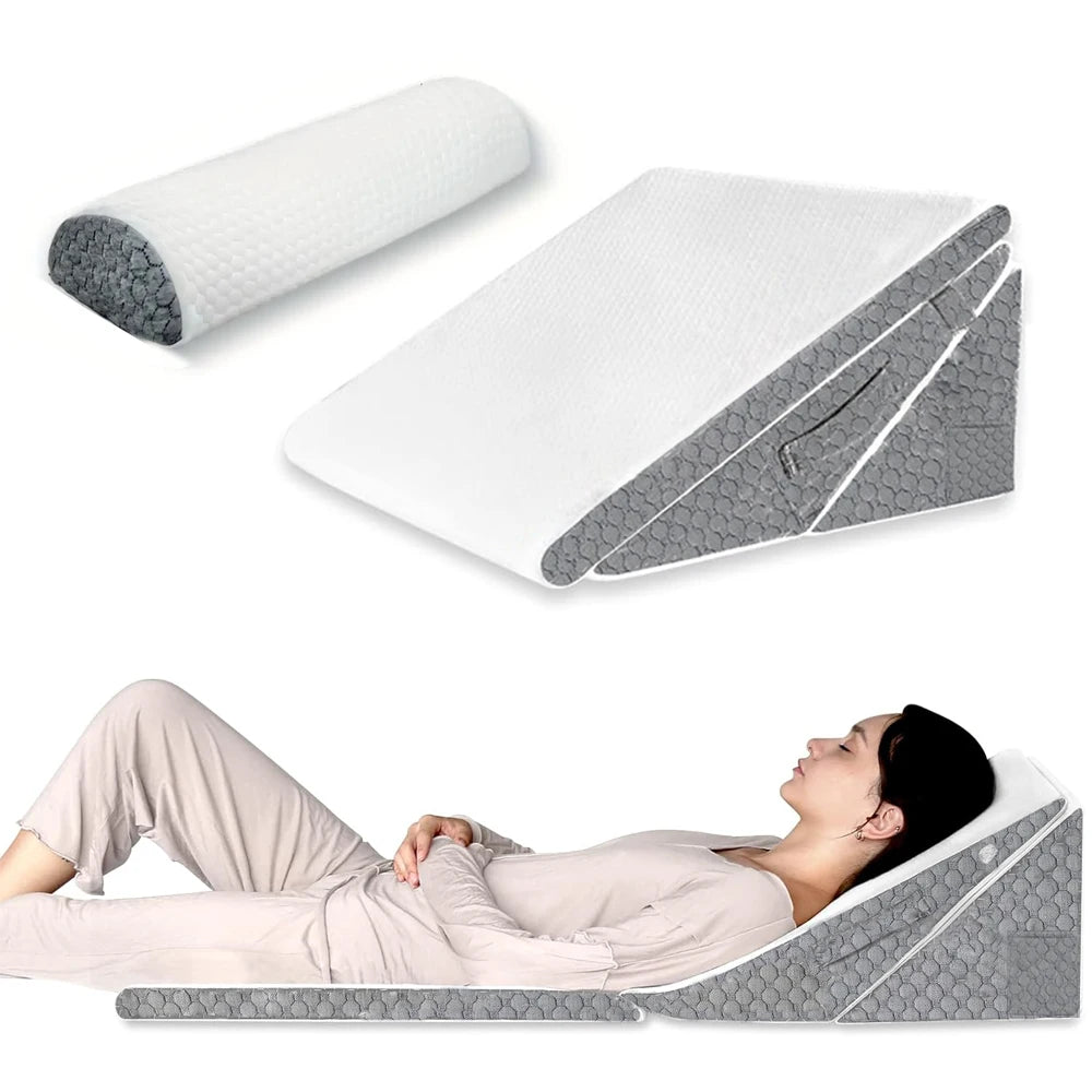 Gray wedge pillow with rolled-up mat and person lying on wedge pillow on white background