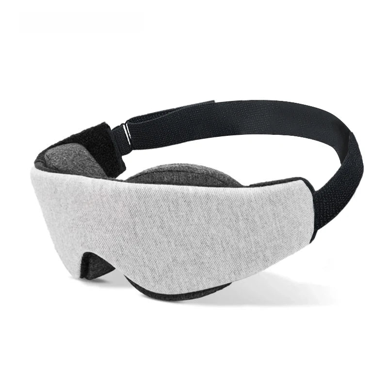 Grey sleep mask with black strap.