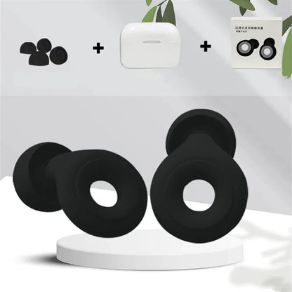 Black silicone donut-shaped products on a white stand with a neutral background